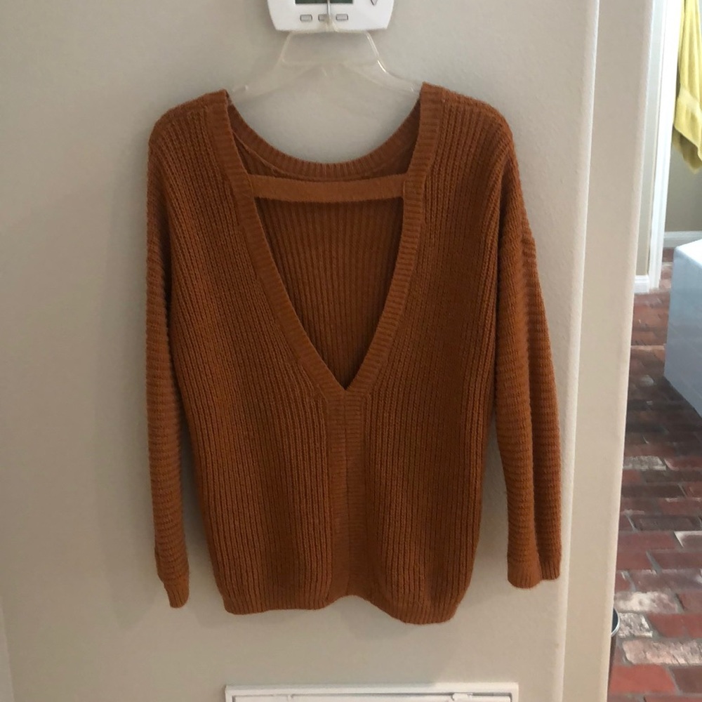 Rust orange sweater with open back